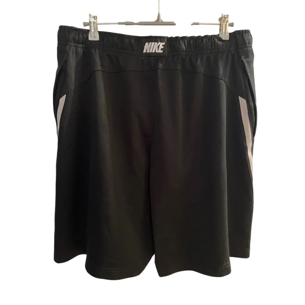 Nike Black Athletic Shorts polyester white strip on sides, side pockets  C